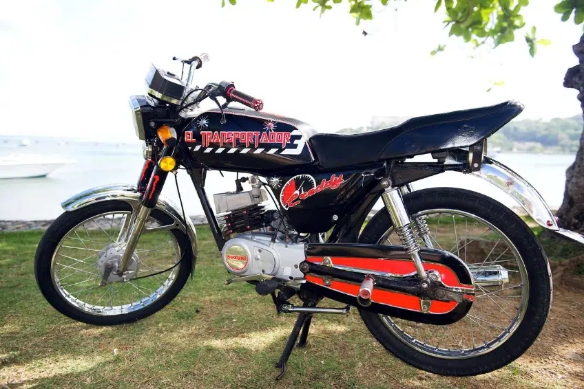 Dominican motoconcho motorcycle parked near waterfront in Cabo Rojo, Dominican Republic