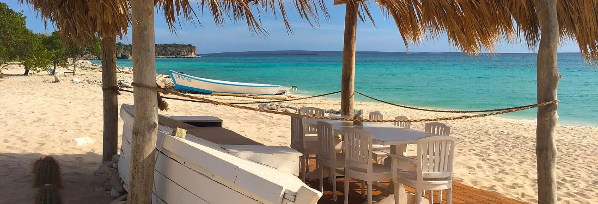Palapa-covered beachside dining area with ocean view in Cabo Rojo, Dominican Republic