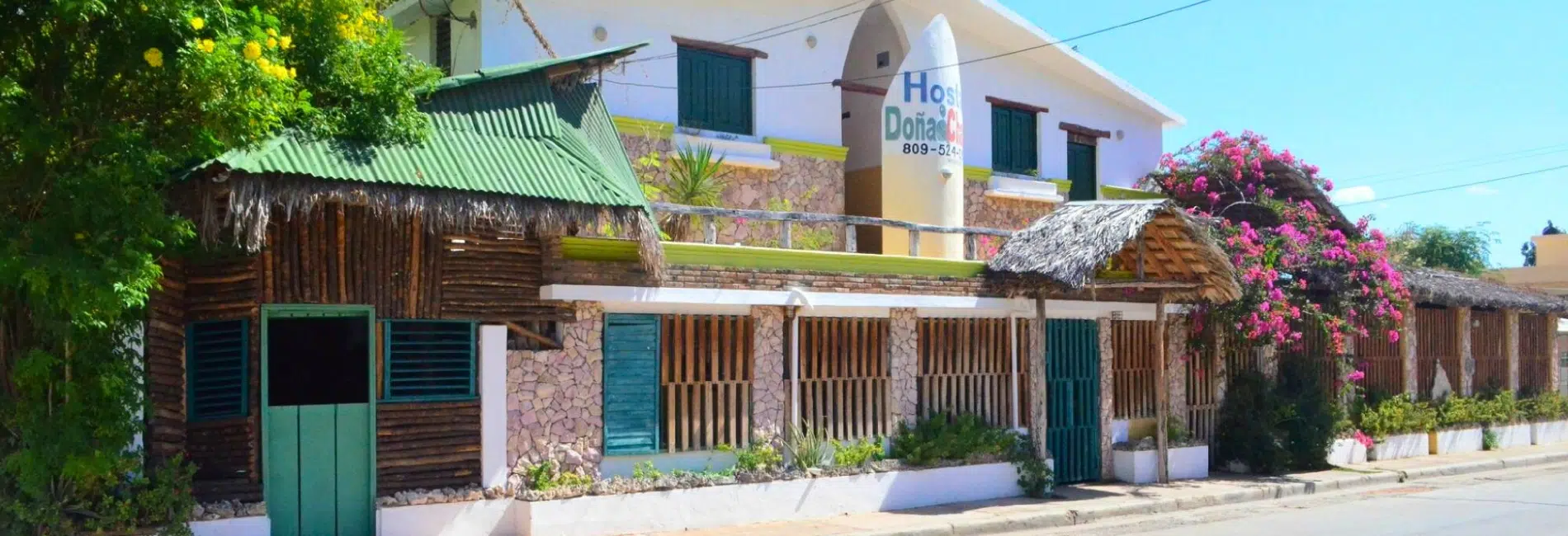 Hostal Dona with thatched palapa entrance in Cabo Rojo, Dominican Republic