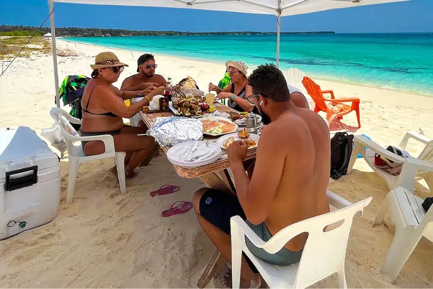 Group dining together on Bahia de las Aguilas