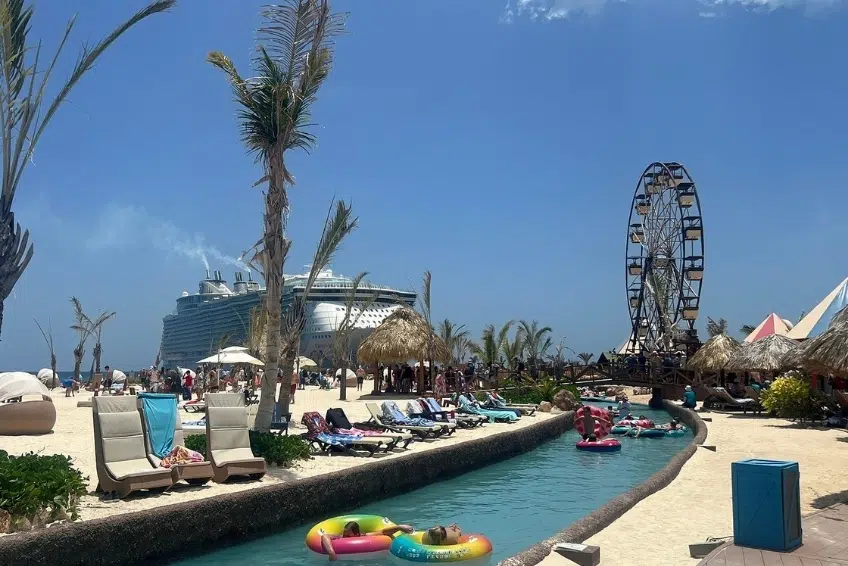 Lazy river with cruise ship and Ferris wheel at Cabo Rojo Cruise Port
