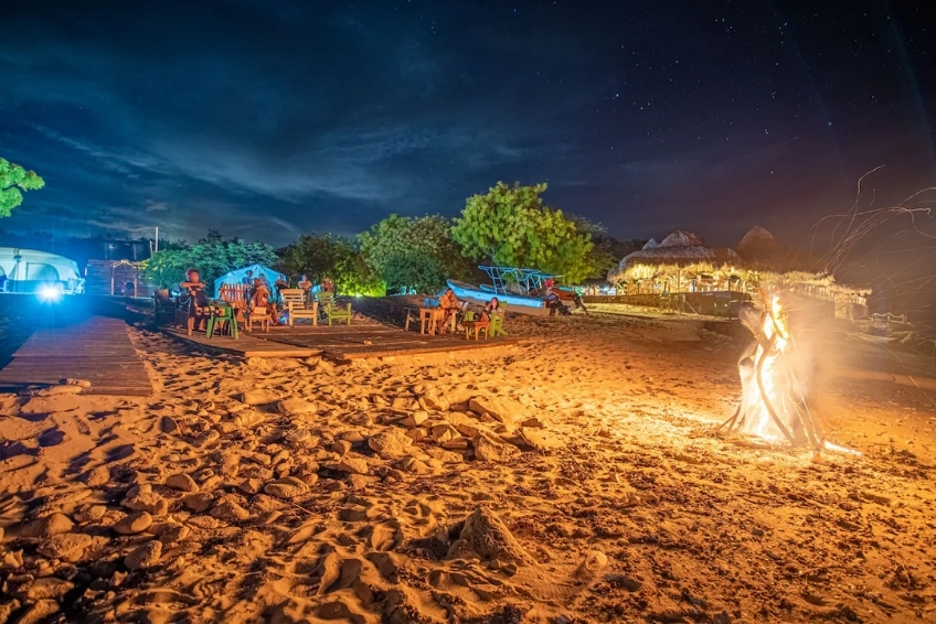 Beachside bonfire at Glamping EcoLodge Cueva de las Aguilas