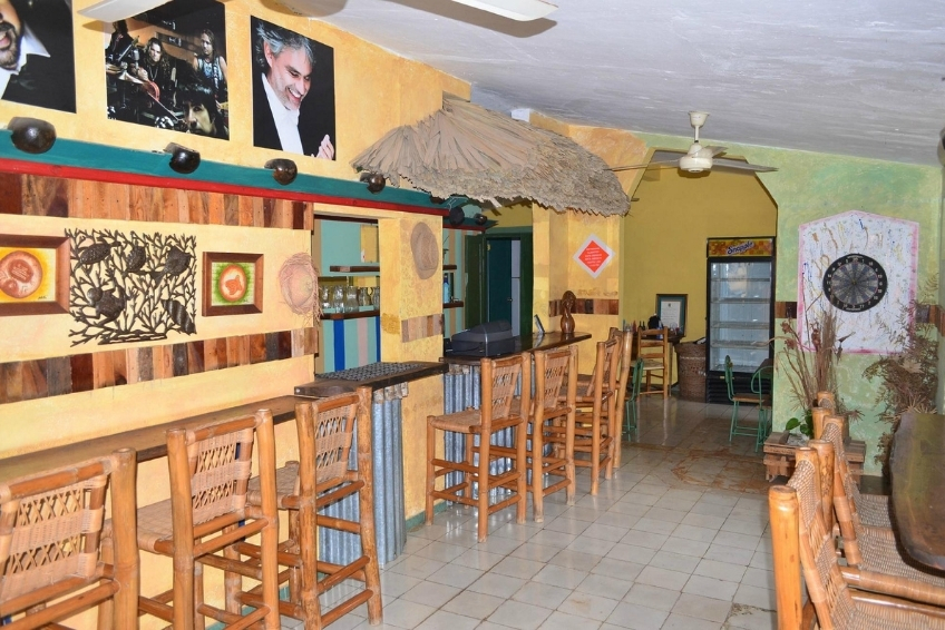 Colorful bar interior at Hostal Dona Chava