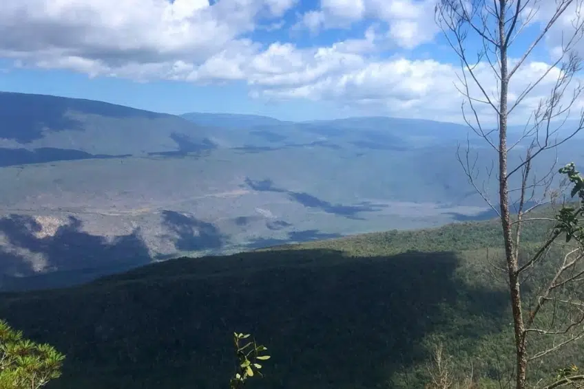 Vast layered mountain ridges stretching to distant horizon at Hoyo de Pelempito Viewpoint