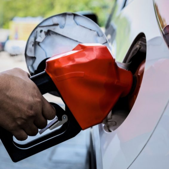 Where To Stay - Fill Your Gas Tank Pumping gas into a rental car in Cabo Rojo, DR