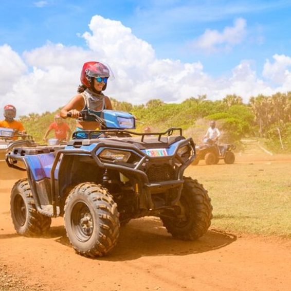 Group ATV tour riding through Cabo Rojo, Dominican Republic