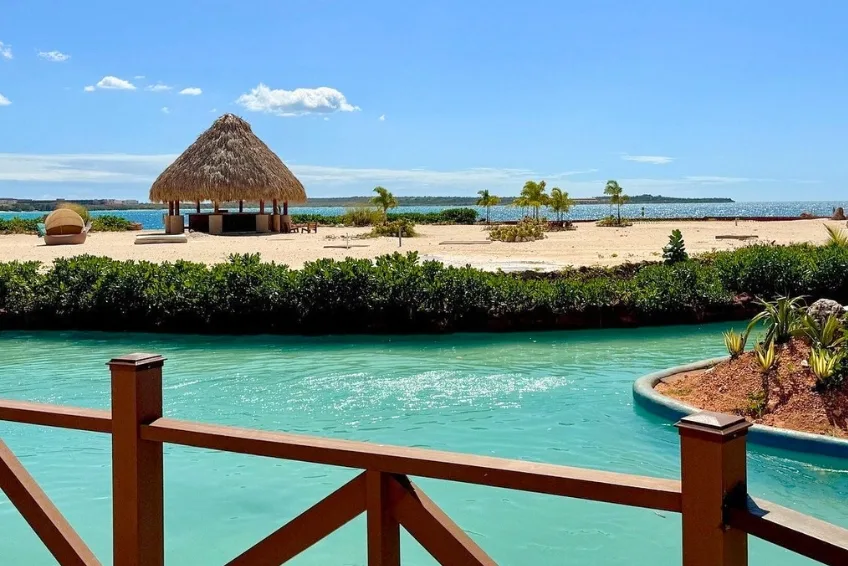 Beachfront cabana with turquoise lagoon at Port Cabo Rojo