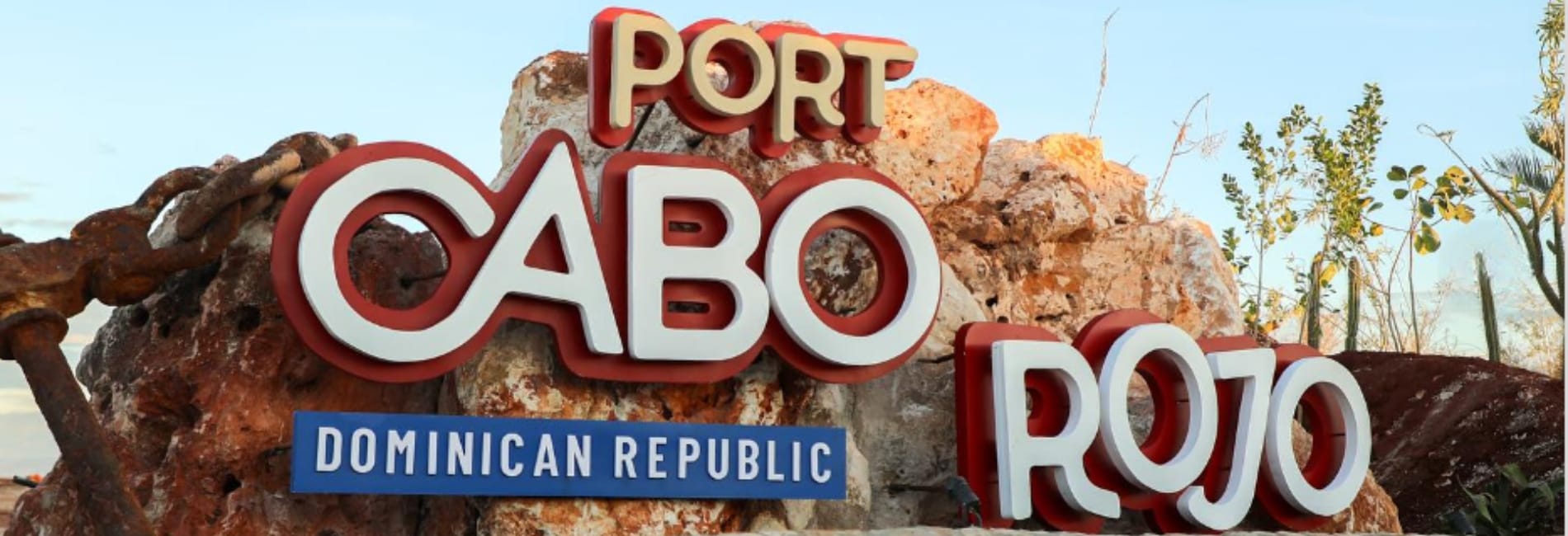 Port Cabo Rojo Dominican Republic welcome sign on rocks