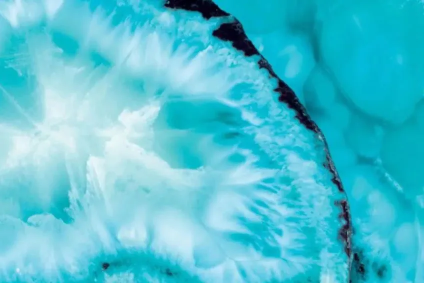 What Is Larimar Close-up of Larimar showing dolphin stone wave patterns