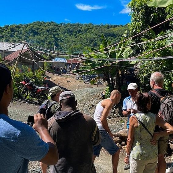 Visitors learning about Larimar mining at Los Chupaderos